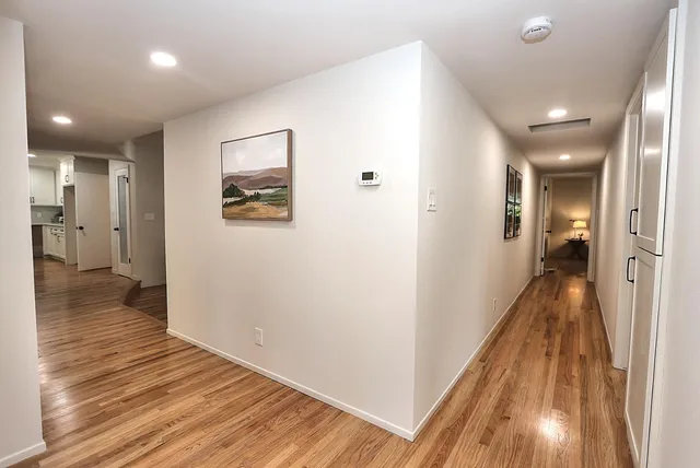 a aerial view of a house with a yard and plants