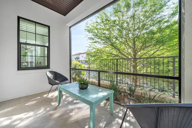 a view of a balcony with couch