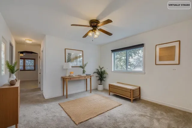 a living room with furniture and a couch