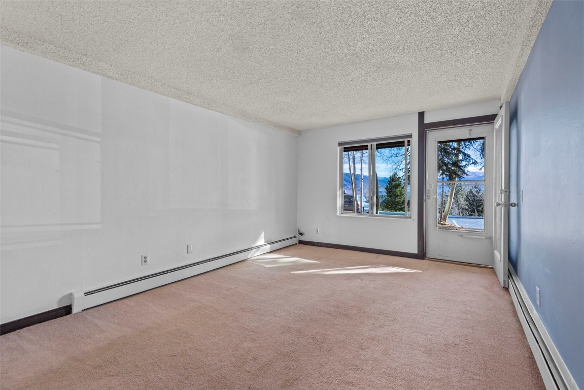 7307 Ryan Gulch Road, Unit 7307 Silverthorne, CO 80498 - Photo 17 of 20 a view of an empty room with a window