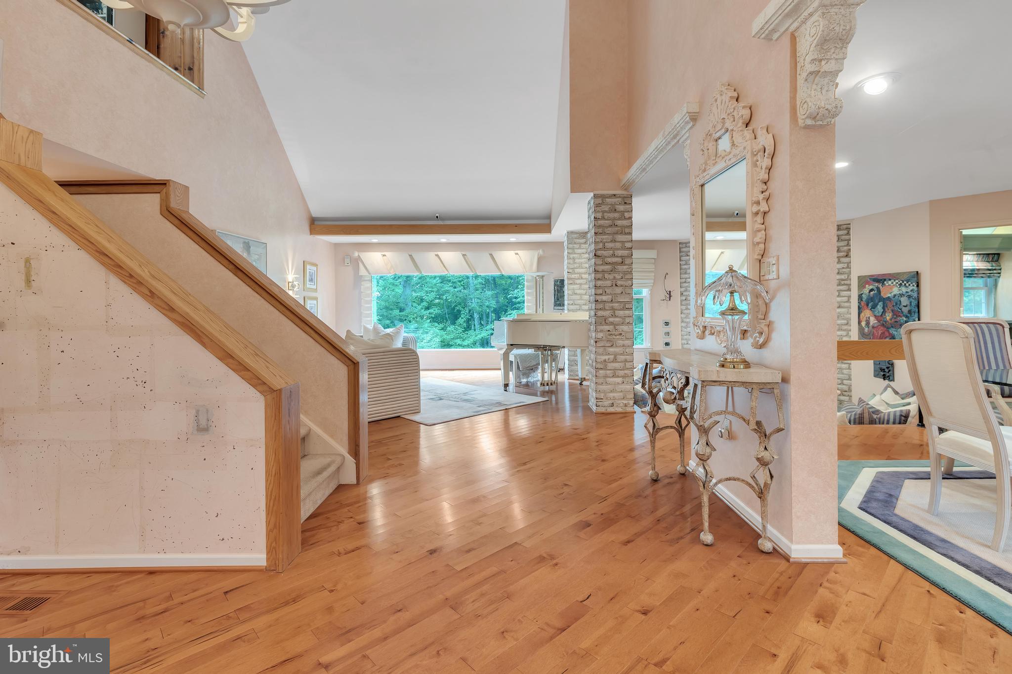 Open concept first floor with two story foyer