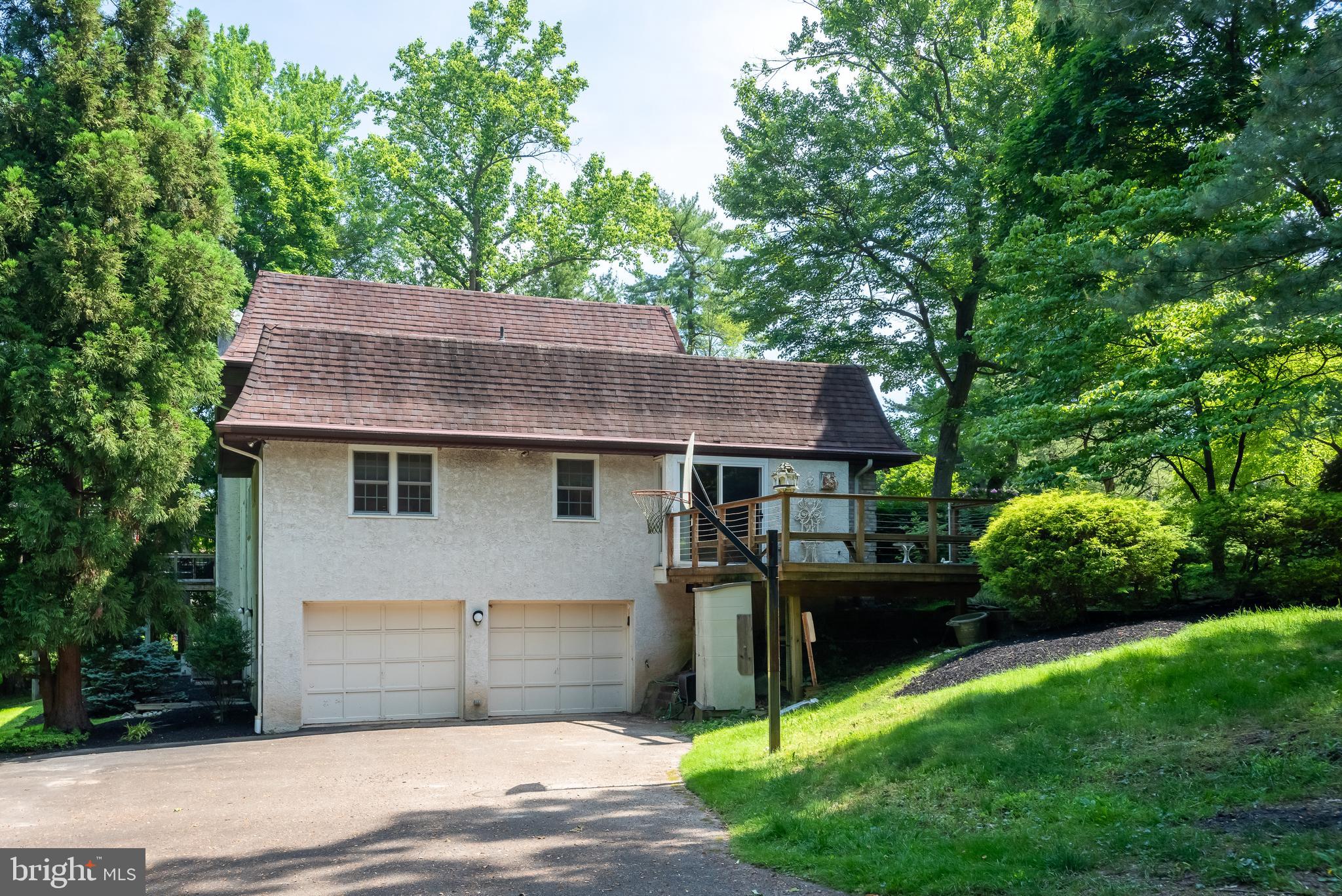 2 car attached garage with lower driveway
