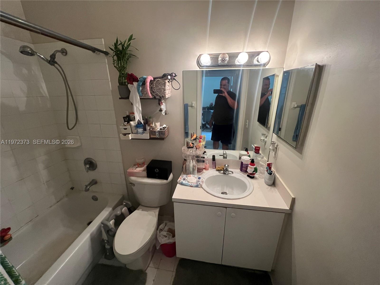 45 Southwest 14th Terrace Homestead, FL 33030 - Photo 23 of 40 a bathroom with a sink toilet and shower