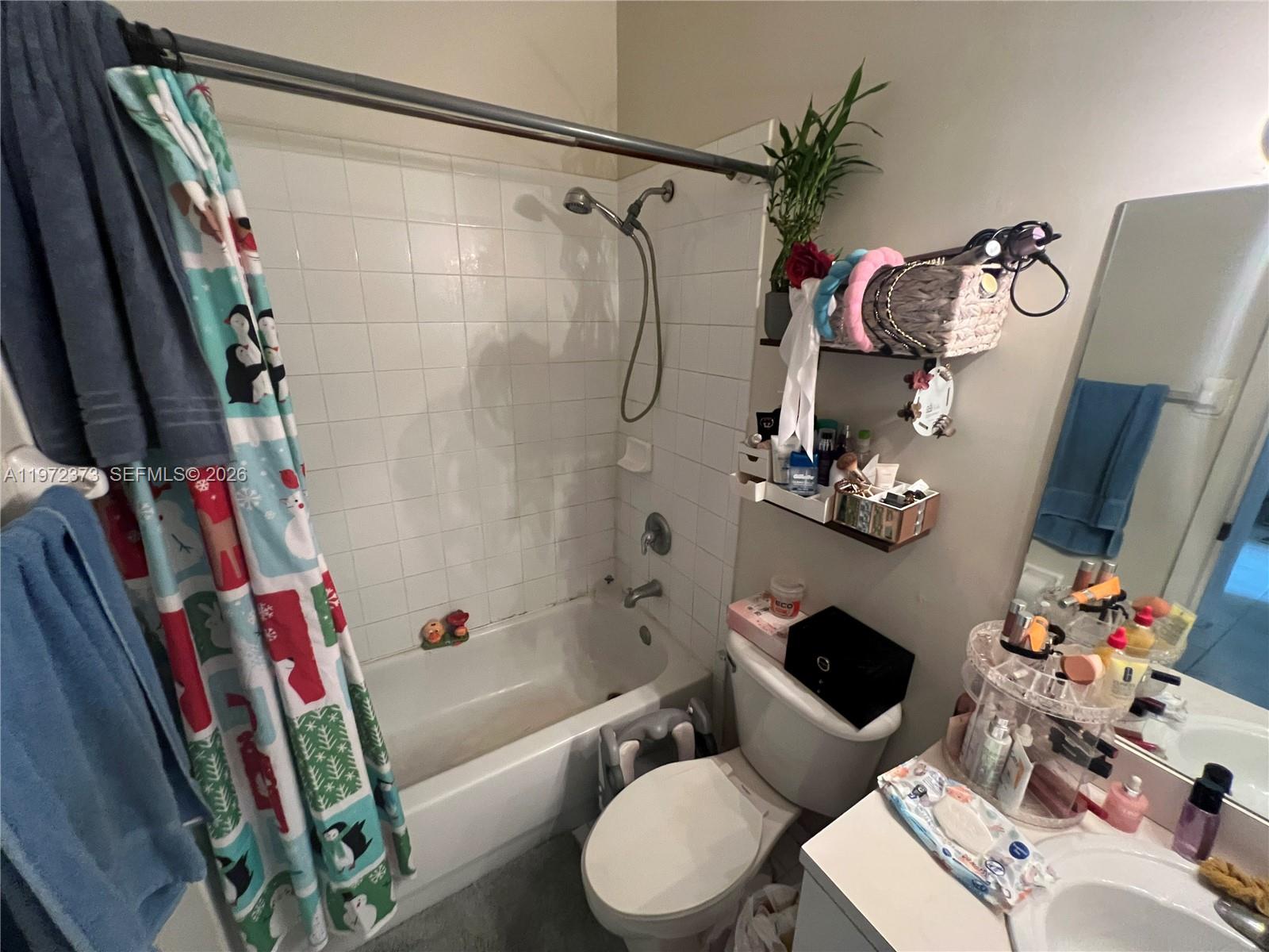 45 Southwest 14th Terrace Homestead, FL 33030 - Photo 24 of 40 a bathroom with a sink toilet and shower