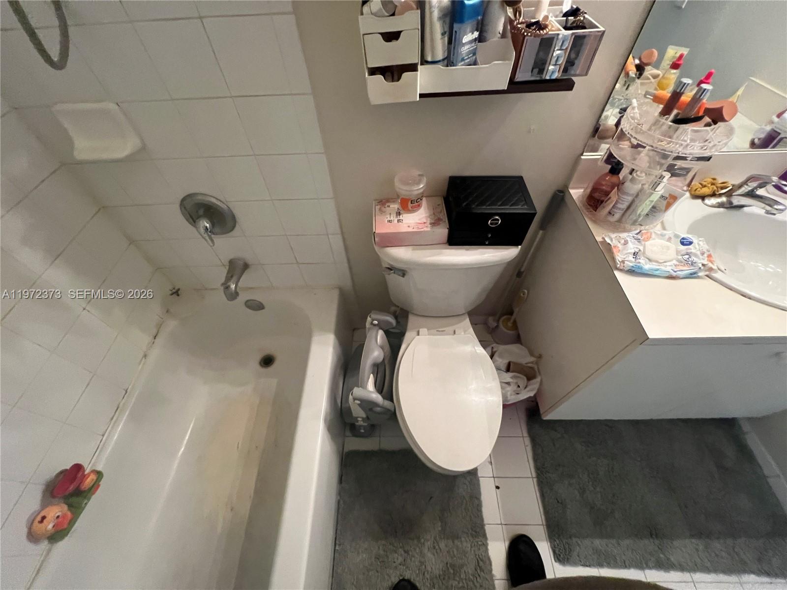 45 Southwest 14th Terrace Homestead, FL 33030 - Photo 25 of 40 a bathroom with a toilet and a shower