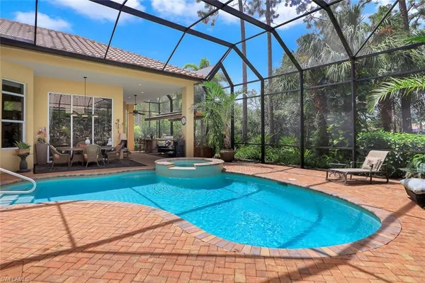 a view of a house with swimming pool