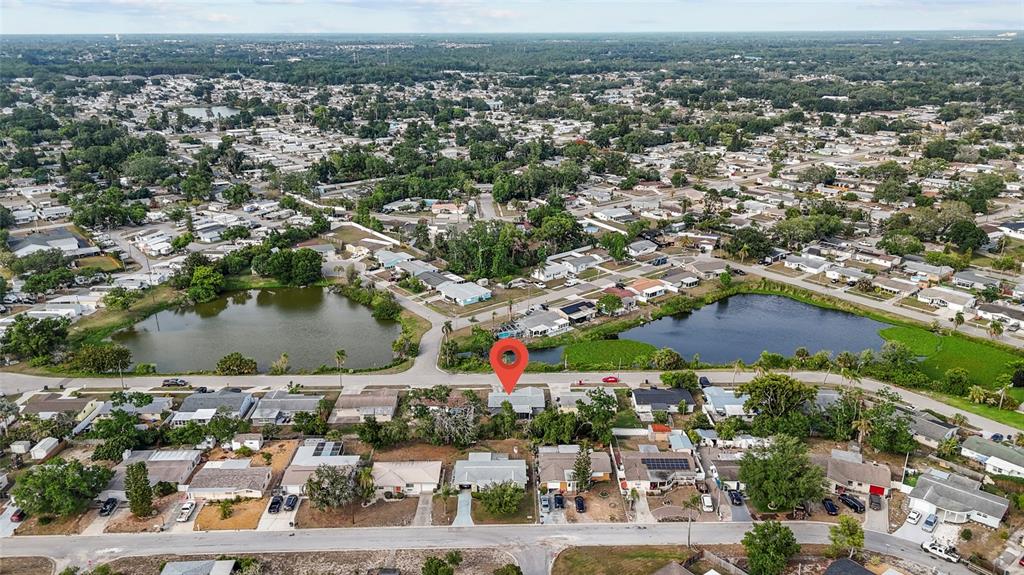 1623 Plum Tree Road Holiday, FL 34690 - Photo 27 of 33 an aerial view of multiple house