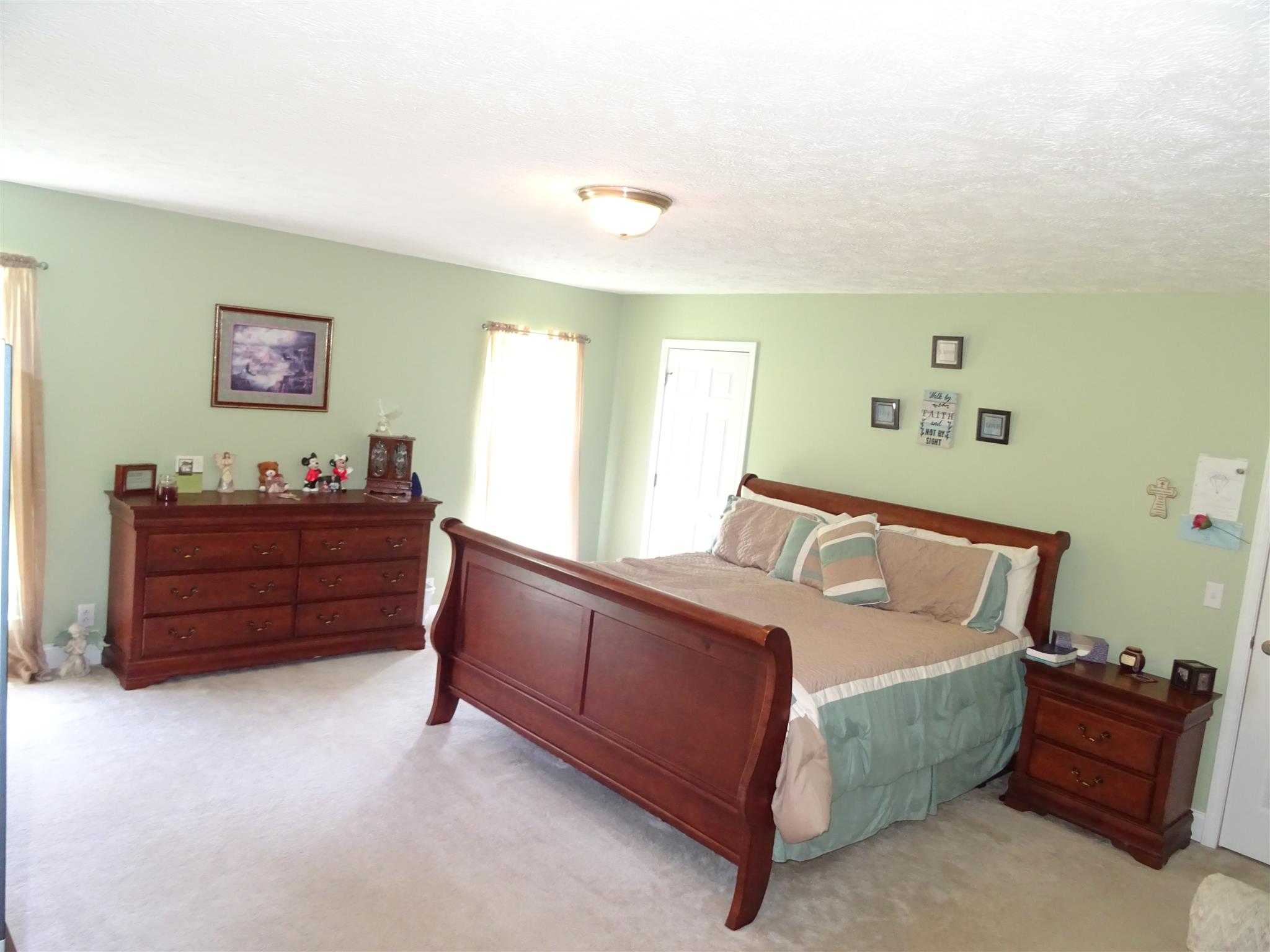 1246 Dillon Road Milton, TN 37118 - Photo 12 of 29 a bed room with a bed and a window