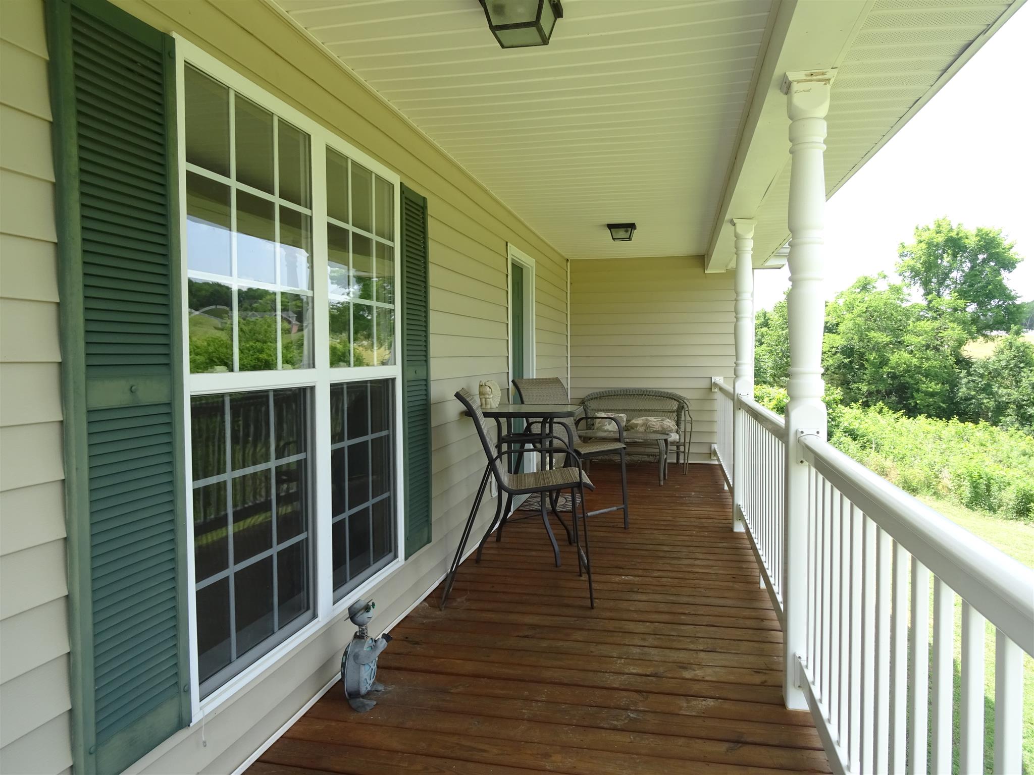 1246 Dillon Road Milton, TN 37118 - Photo 17 of 29 a view of a balcony with chairs
