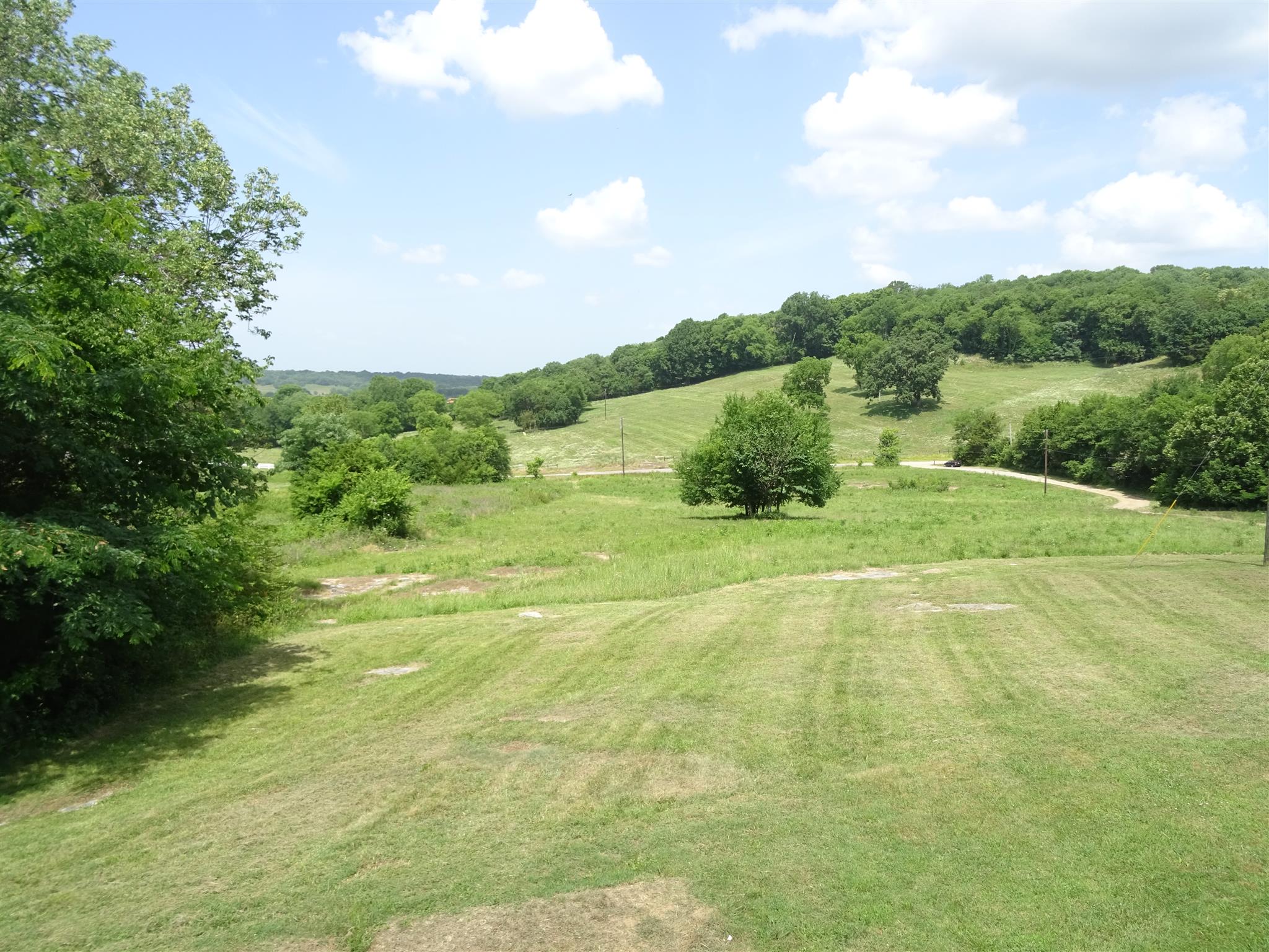 1246 Dillon Road Milton, TN 37118 - Photo 18 of 29 a view of an outdoor space and basketball court