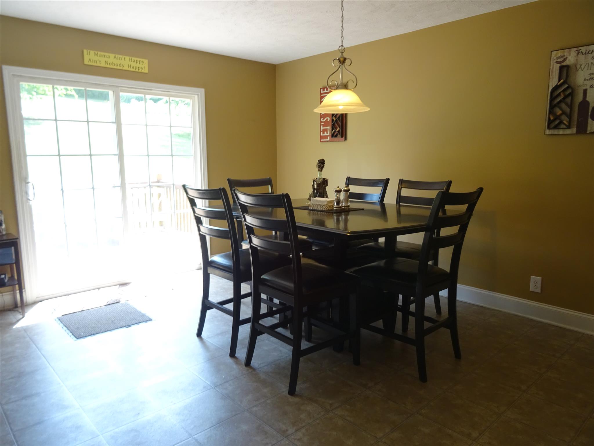 1246 Dillon Road Milton, TN 37118 - Photo 6 of 29 a view of a dining room with furniture and chandelier