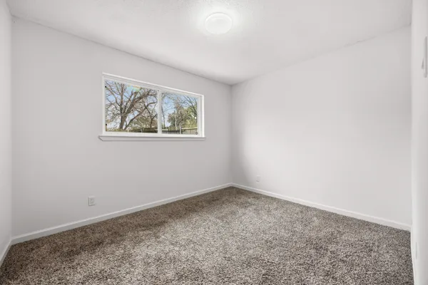 an empty room with a window