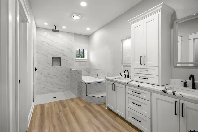 a bathroom with a toilet and a sink