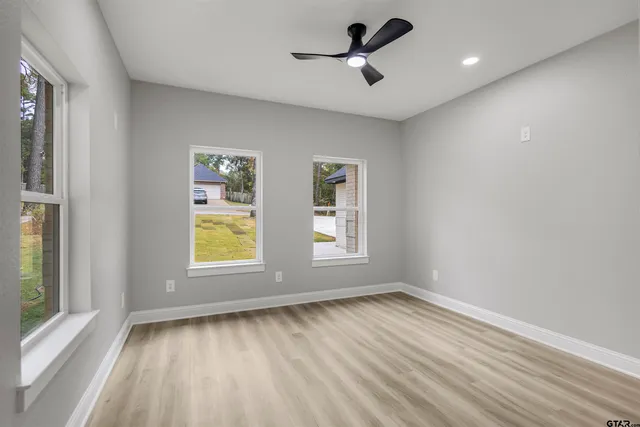 a view of a livingroom with wooden floor