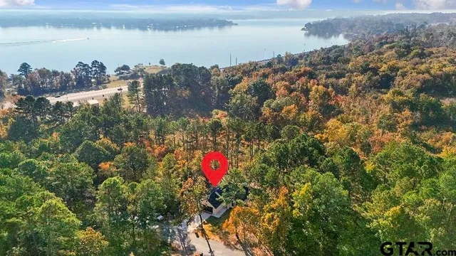 a view of kitchen with cabinets appliances and wooden floor