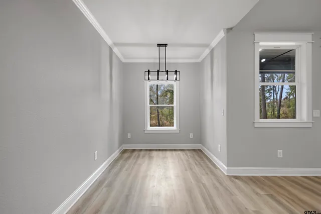 a kitchen with a stove and a sink