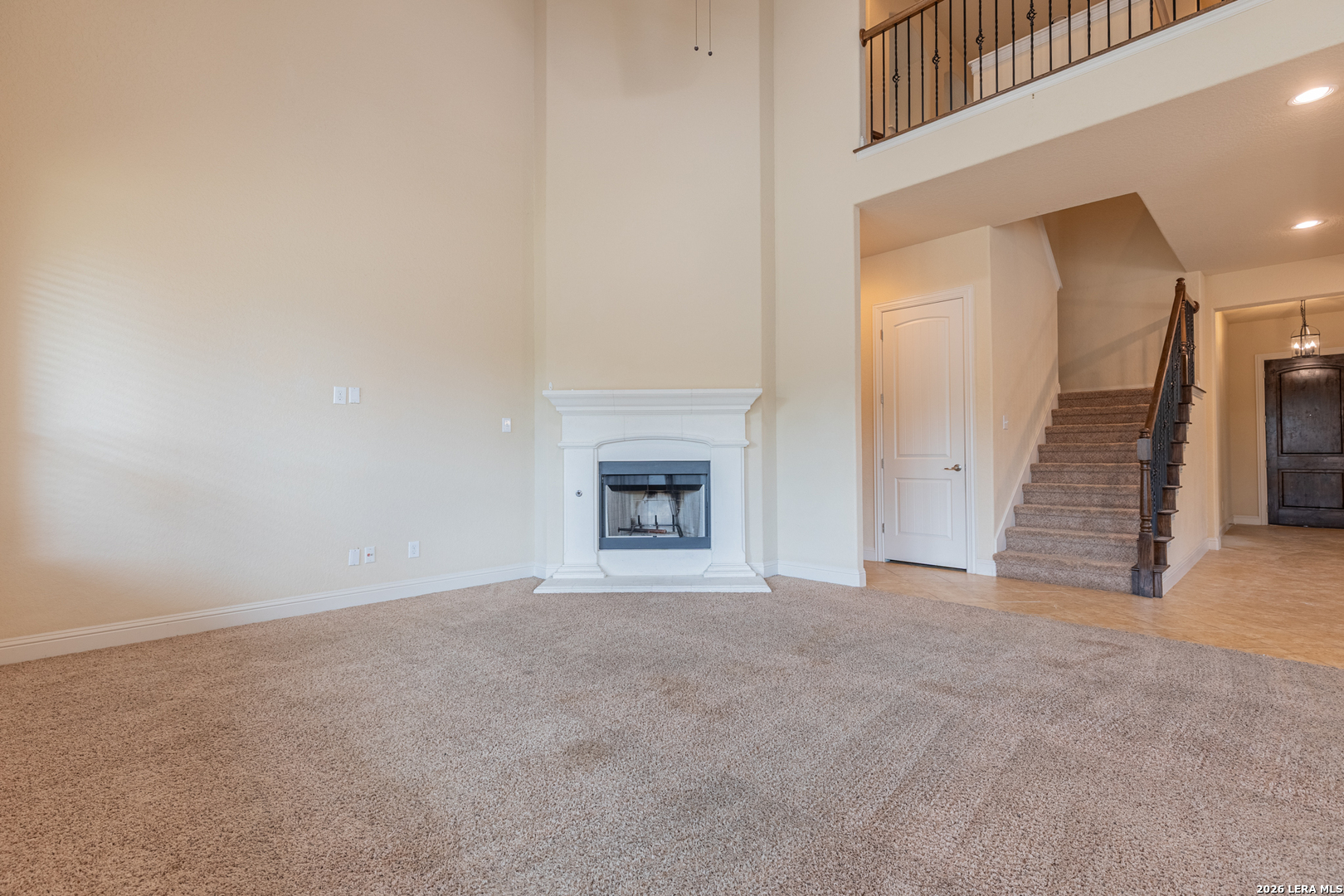 8103 Mystic Chase Boerne, TX 78015 - Photo 13 of 49 a view of an empty room with a fireplace