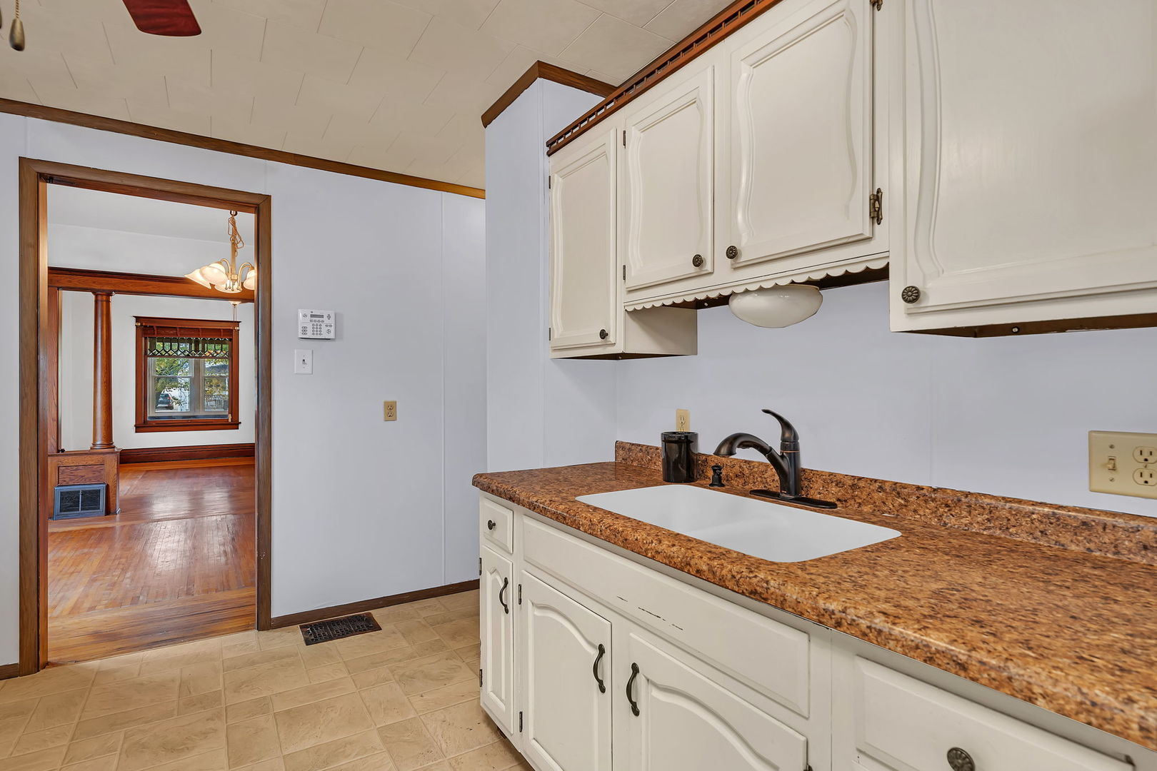308 East Delaware Street Dwight, IL 60420 - Photo 12 of 29 a kitchen with stainless steel appliances granite countertop a sink and cabinets