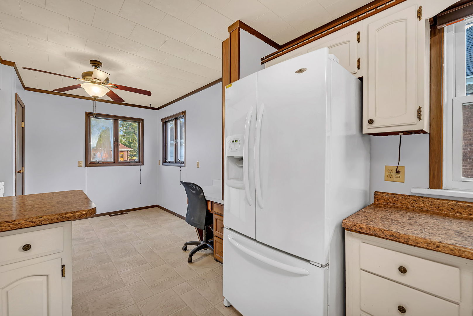 308 East Delaware Street Dwight, IL 60420 - Photo 14 of 29 a view of hallway with granite countertop cabinets and a window