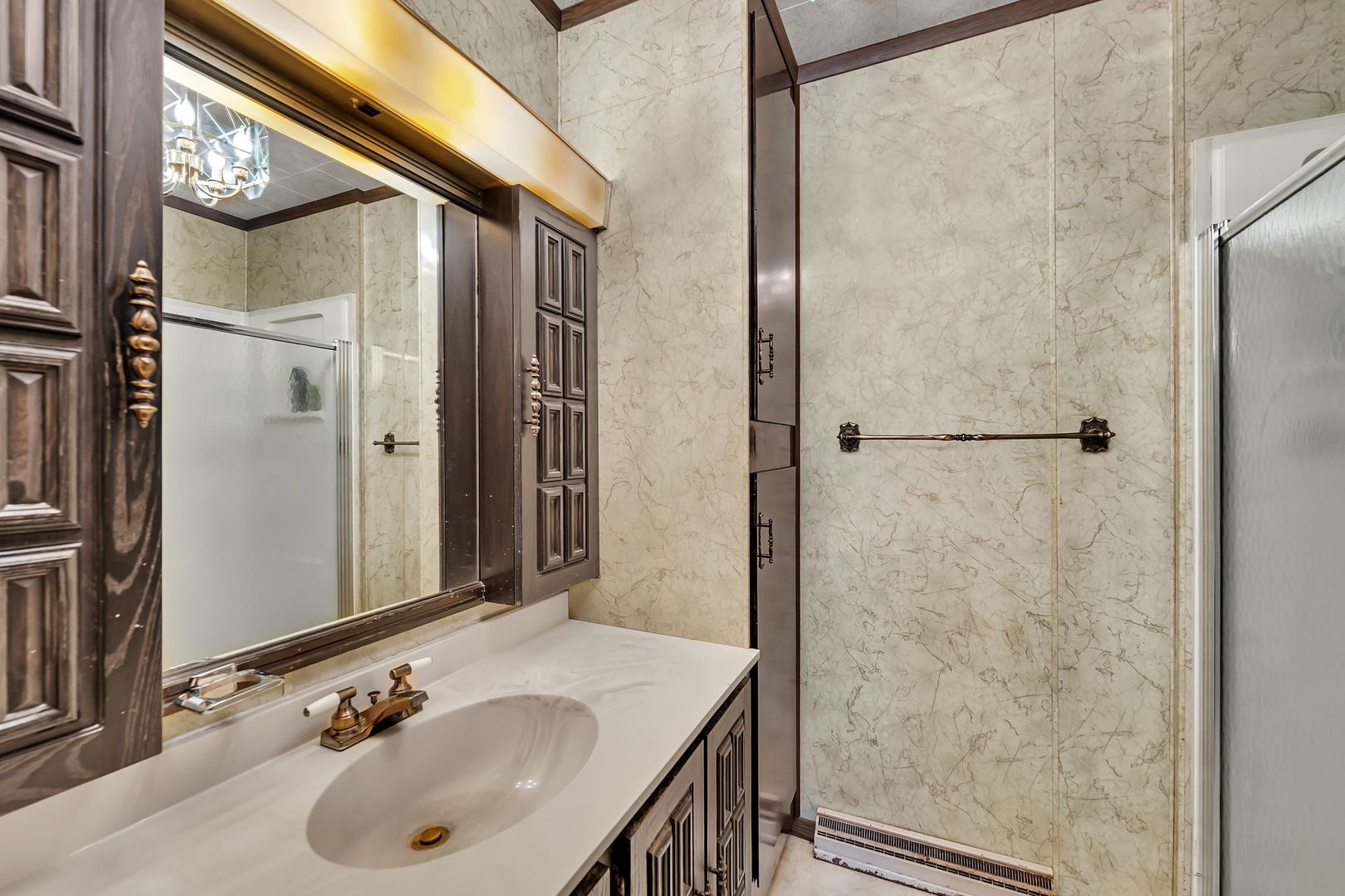 308 East Delaware Street Dwight, IL 60420 - Photo 20 of 29 a bathroom with a sink and a mirror