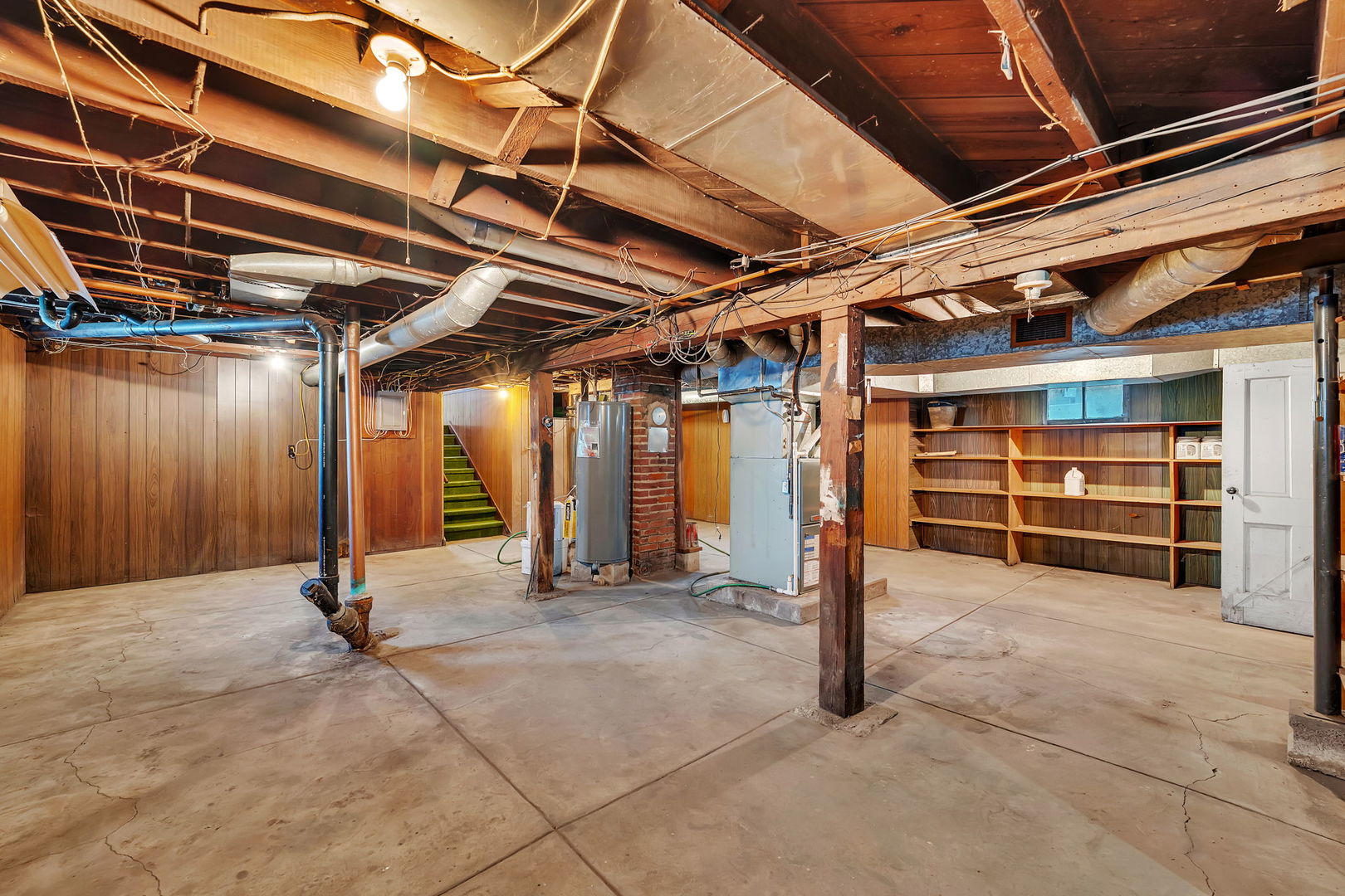 308 East Delaware Street Dwight, IL 60420 - Photo 24 of 29 a view of an empty room with wooden walls