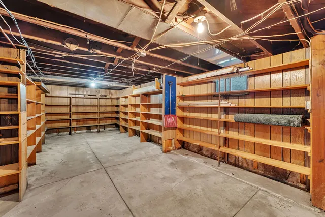 a view of an empty room with a garage