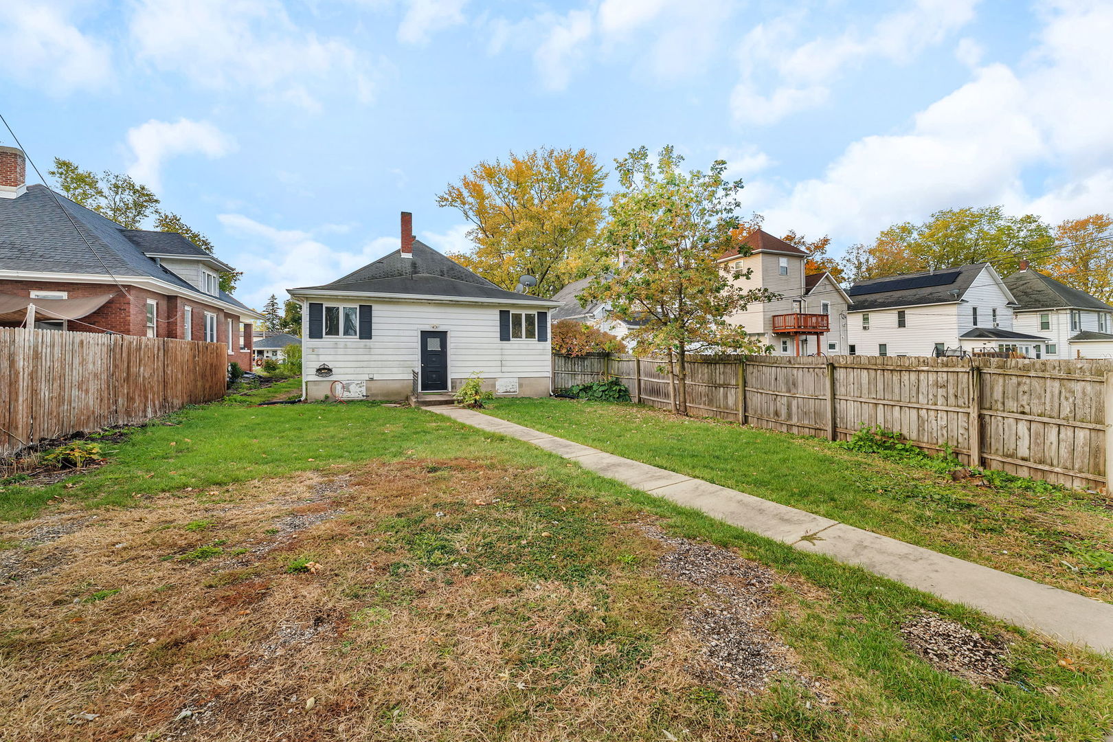 308 East Delaware Street Dwight, IL 60420 - Photo 28 of 29 a view of house with a big yard and large trees
