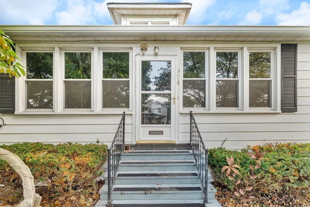 a view of a house with a large window