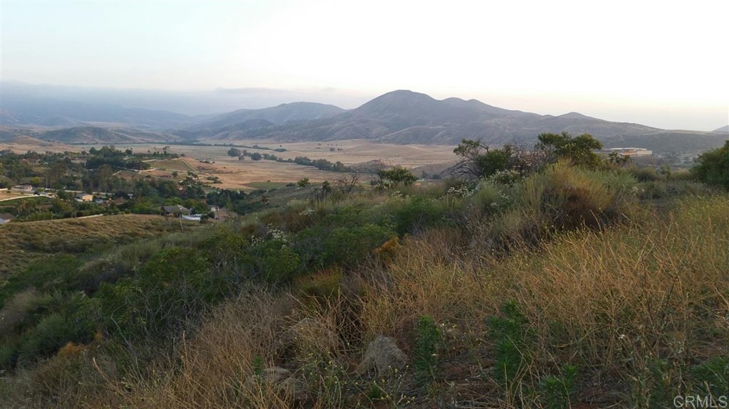 Hillside Estates Jamul, CA 91935 - Photo 13 of 24 a view of a town with mountains in the background