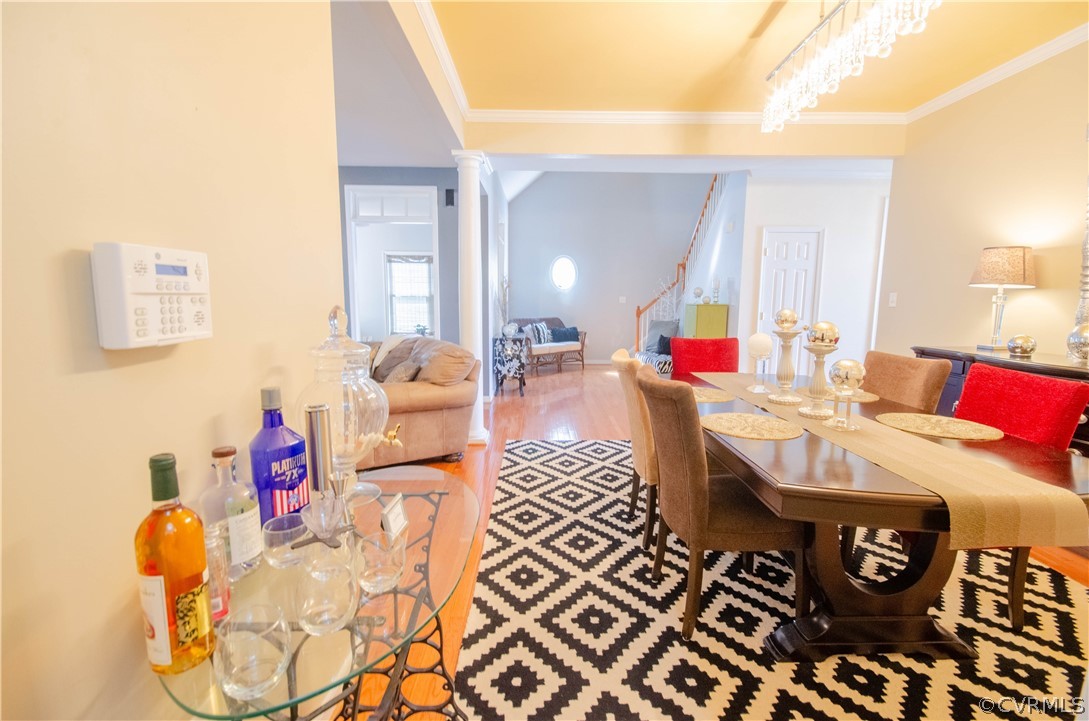 1113 Alcorn Terrace Midlothian, VA 23114 - Photo 16 of 36 a living room with furniture and a wooden floor