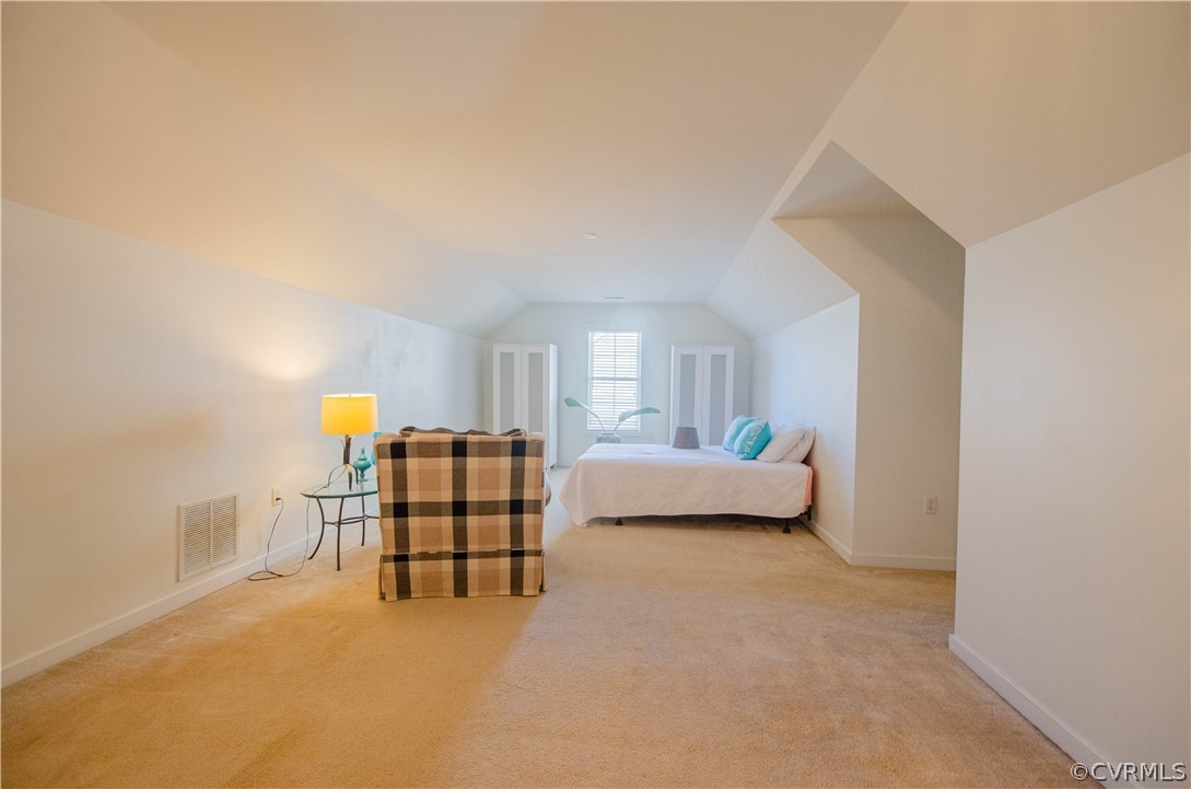 1113 Alcorn Terrace Midlothian, VA 23114 - Photo 19 of 36 a bedroom with a bed and lamp
