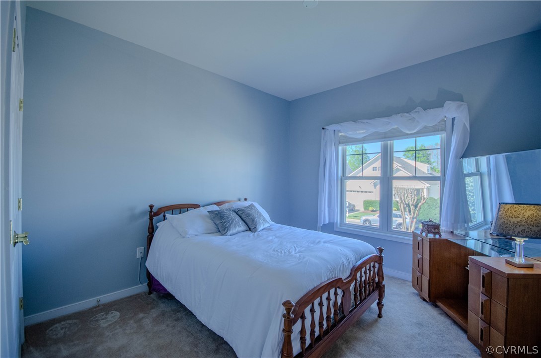 1113 Alcorn Terrace Midlothian, VA 23114 - Photo 29 of 36 a bedroom with a bed and a window