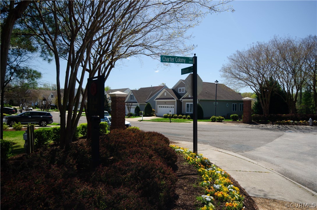 1113 Alcorn Terrace Midlothian, VA 23114 - Photo 35 of 36 a front view of a house with a yard and tree s