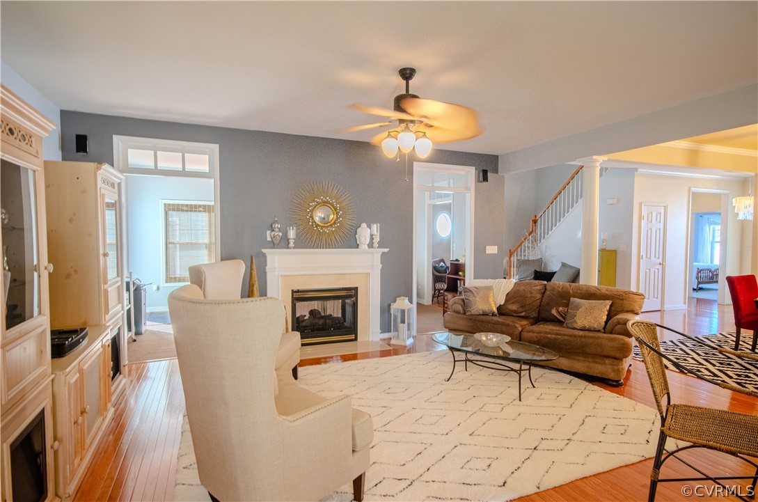 1113 Alcorn Terrace Midlothian, VA 23114 - Photo 9 of 36 a living room with furniture a fireplace and a flat screen tv