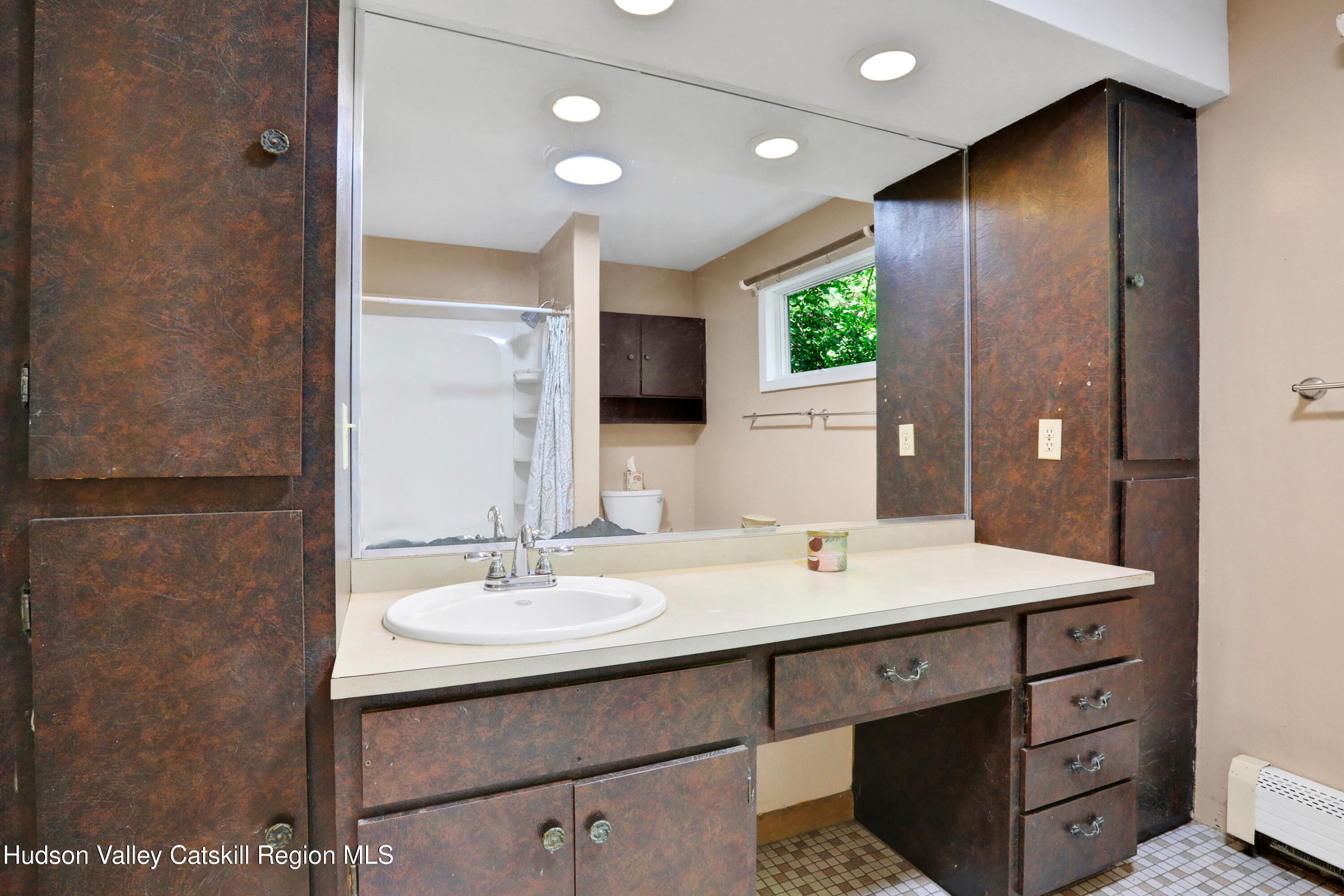 197 Old Rte 32 Saugerties, NY 12477 - Photo 14 of 31 a bathroom with a sink and a mirror