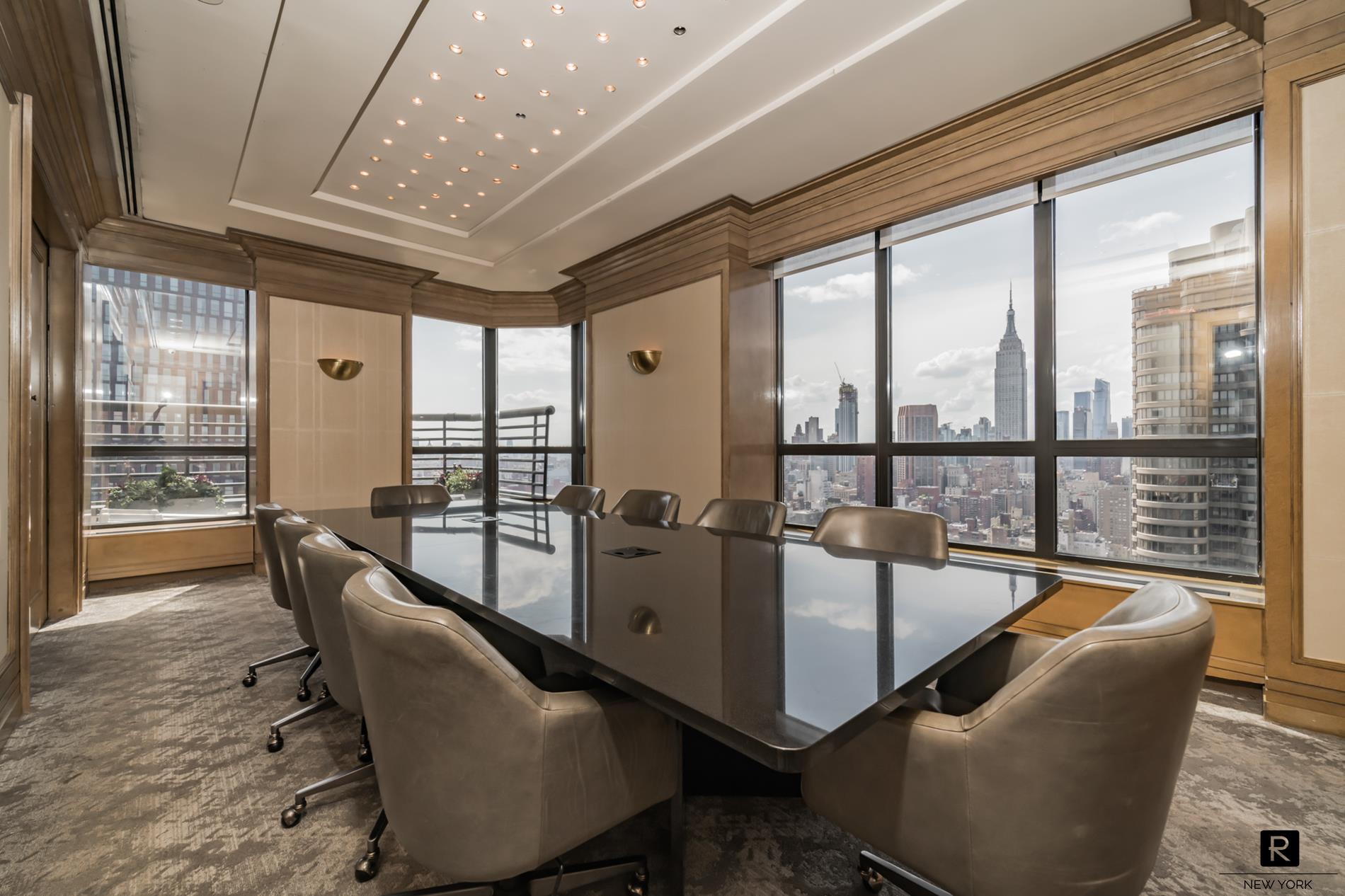 415 East 37th Street, Unit 27D Manhattan, NY 10016 - Photo 12 of 17 a very nice looking living room with a large window