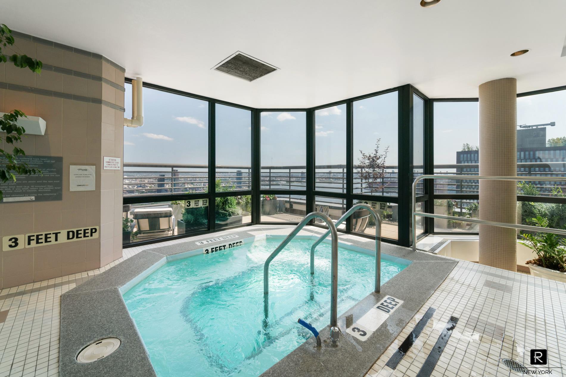 415 East 37th Street, Unit 27D Manhattan, NY 10016 - Photo 8 of 17 a view of a living room with hardwood floor and furniture