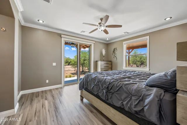 a kitchen with stainless steel appliances kitchen island granite countertop a sink and a refrigerator