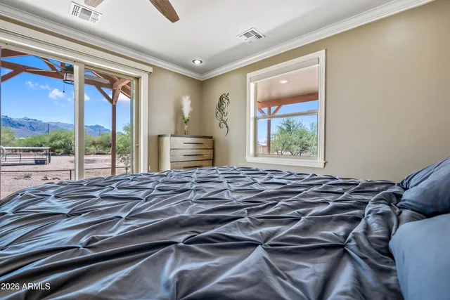 a view of a backyard with sitting area