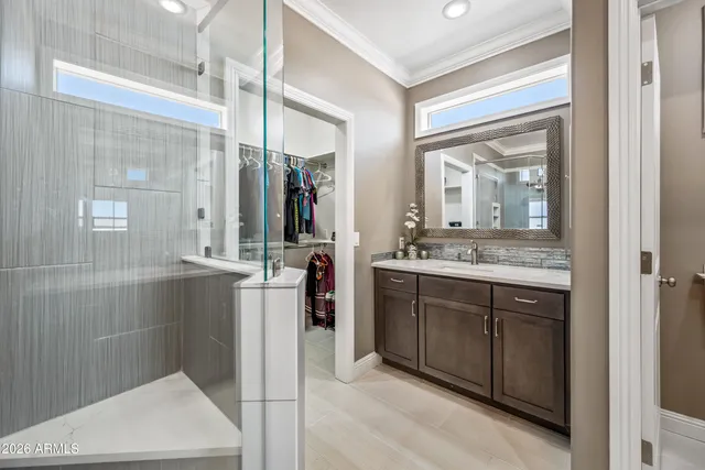 a view of a balcony with a barbeque