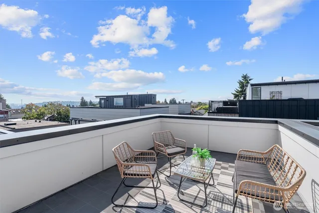 a view of a terrace with furniture