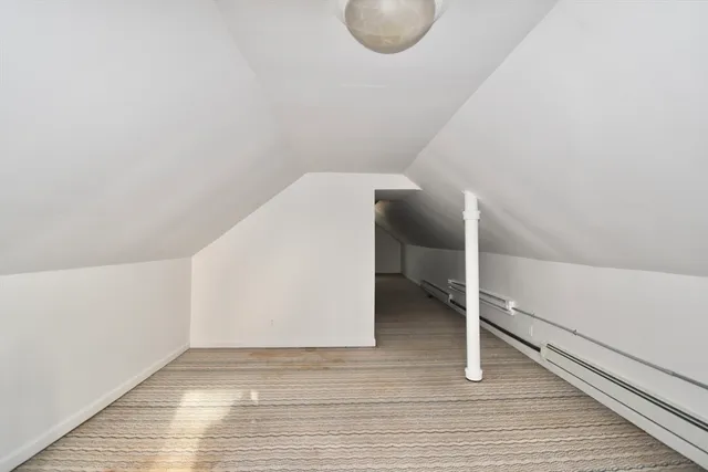 a view of a hallway with staircase