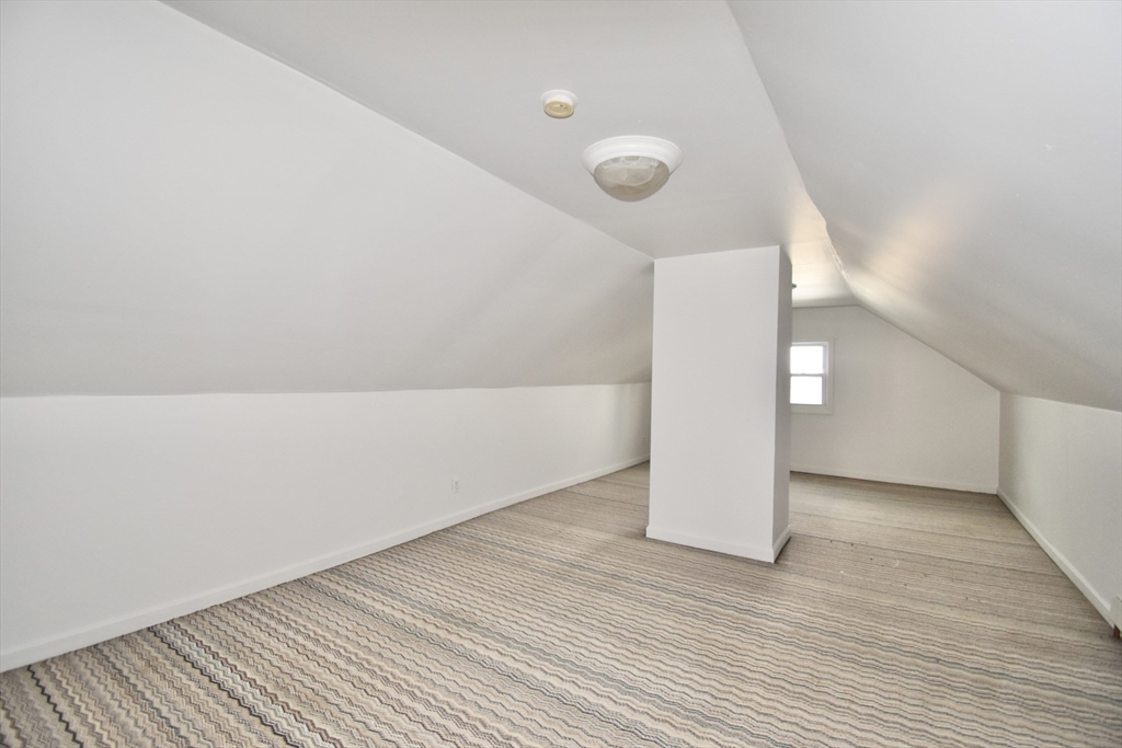 86 Cochran Street, Unit 3 Chicopee, MA 01020 - Photo 17 of 18 a view of an empty room with wooden floor