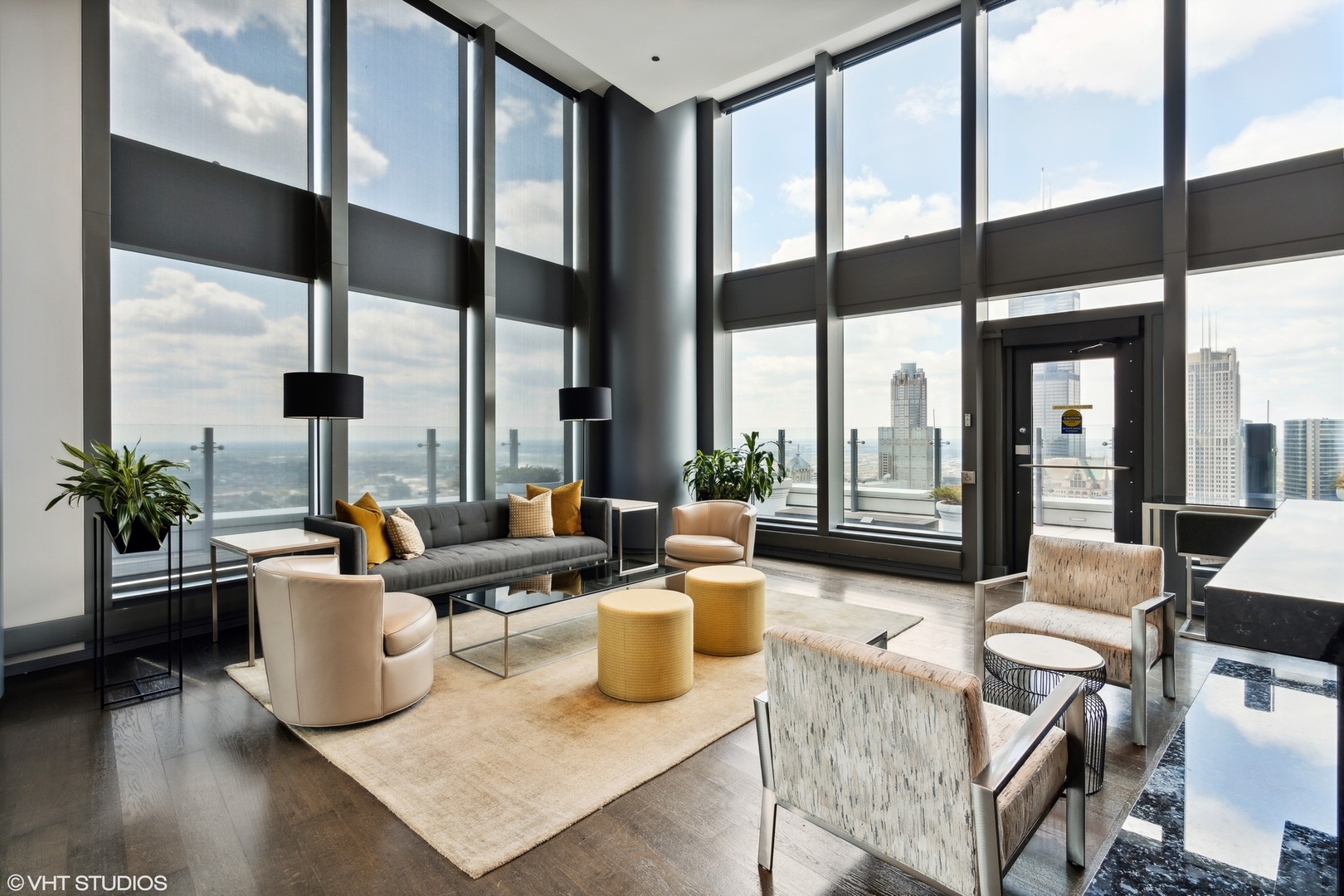 60 East Monroe Street, Unit 2903 Chicago, IL 60603 - Photo 19 of 19 a living room with furniture city view and large windows