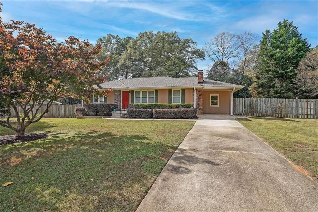 1186 Larch Lane Decatur, GA 30033 - Photo 1 of 1 a front view of a house with a yard