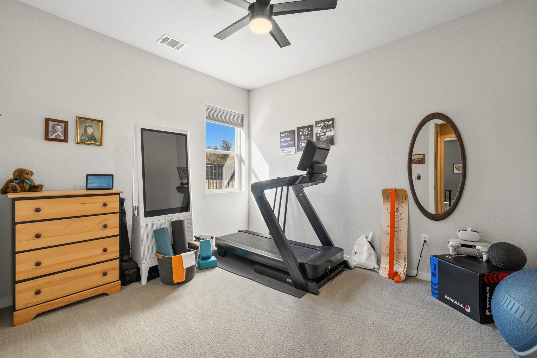 14302 Summit View Drive, Unit 4 Leander, TX 78641 - Photo 20 of 40 Workout area featuring ceiling fan and carpet flooring