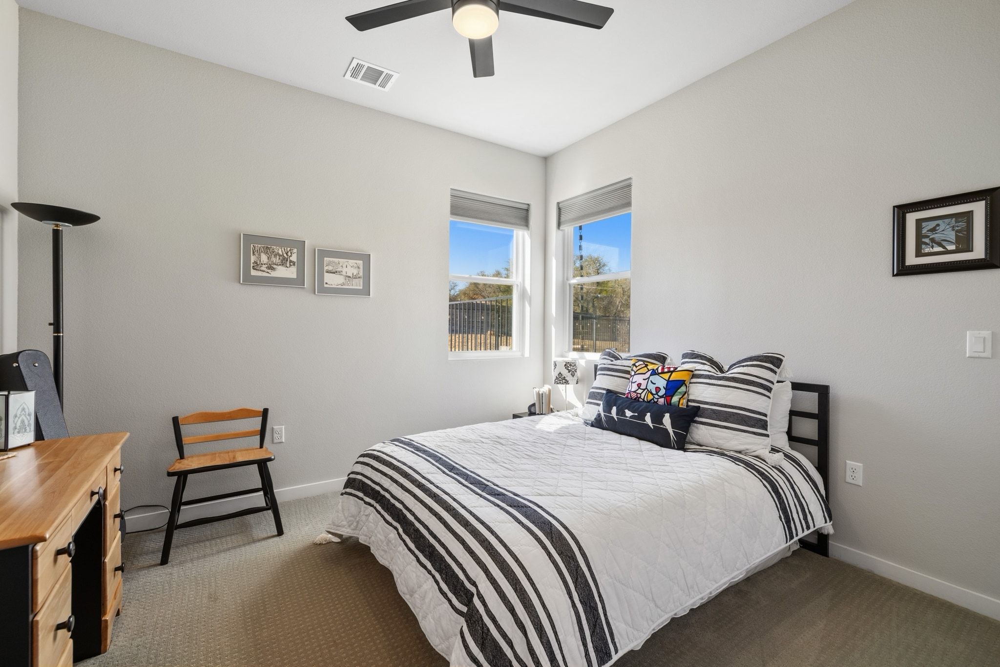 14302 Summit View Drive, Unit 4 Leander, TX 78641 - Photo 21 of 40 Bedroom with dark carpet and ceiling fan