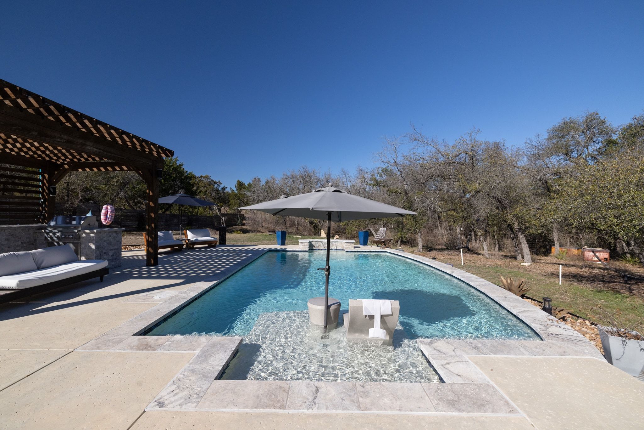 14302 Summit View Drive, Unit 4 Leander, TX 78641 - Photo 23 of 40 Swimming pool with outdoor lounge area, a patio, and a pergola