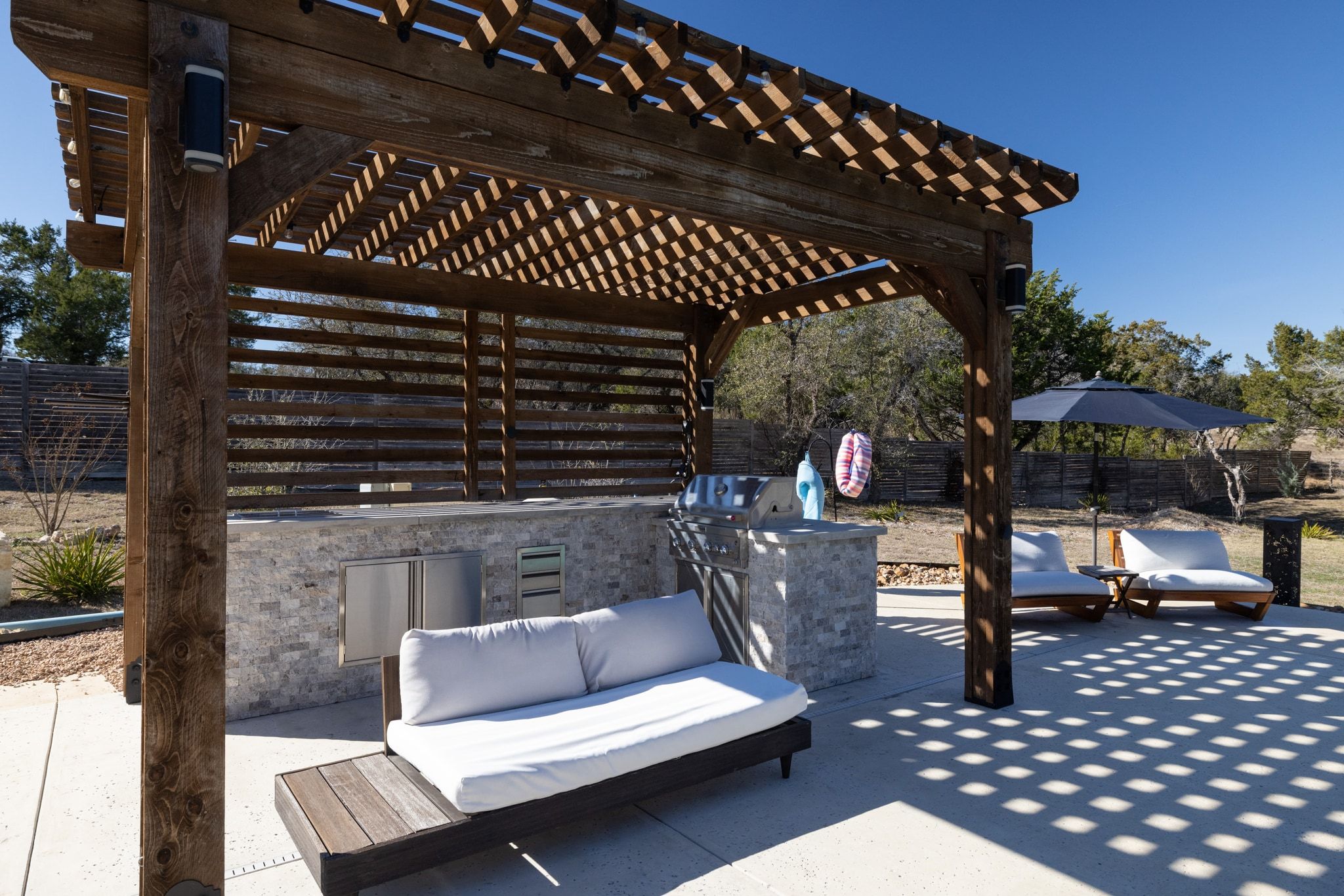 14302 Summit View Drive, Unit 4 Leander, TX 78641 - Photo 25 of 40 View of patio featuring an outdoor kitchen and area to lounge and a pergola