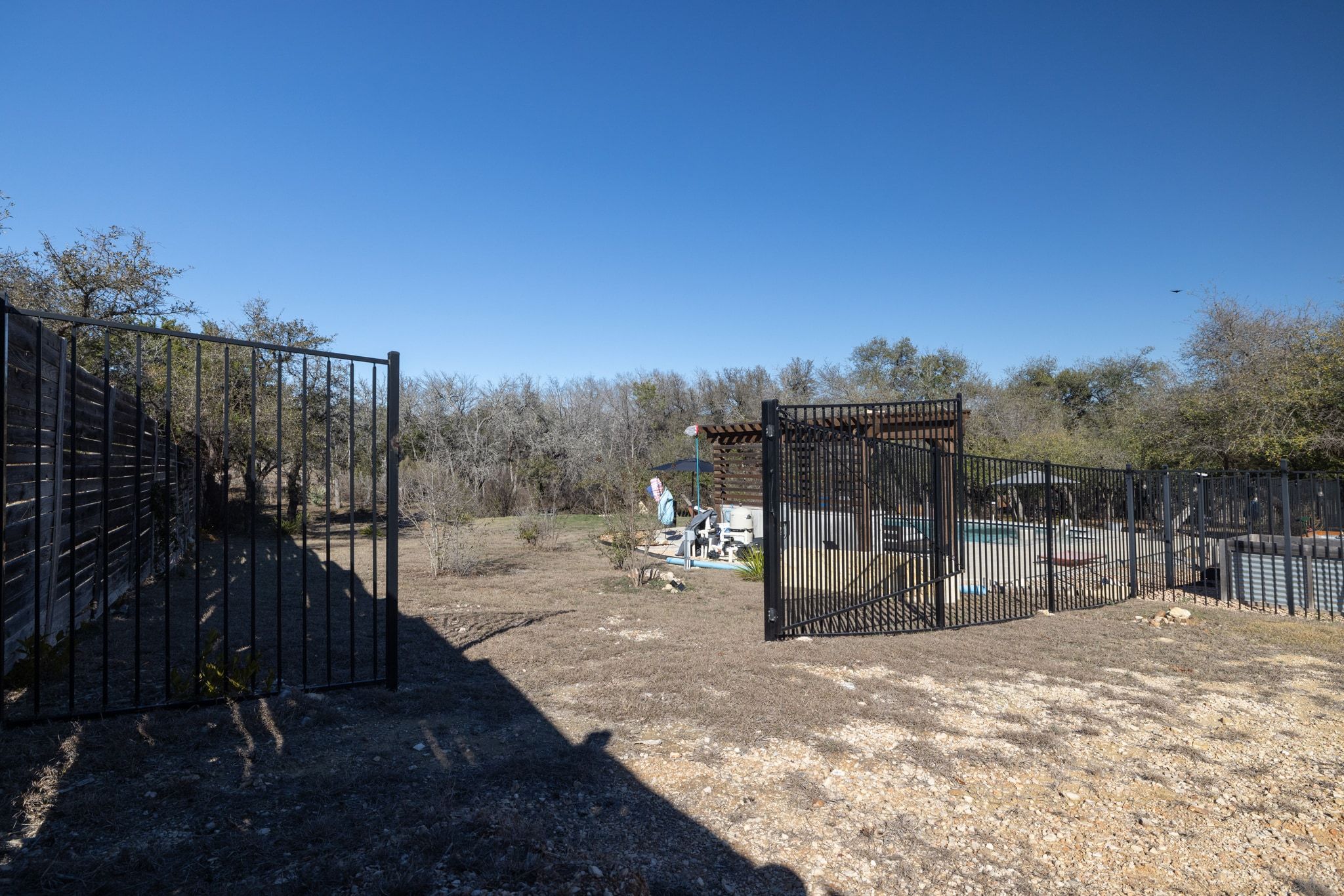 14302 Summit View Drive, Unit 4 Leander, TX 78641 - Photo 33 of 40 View of yard with a community pool